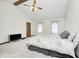 Bright bedroom with vaulted ceiling, wooden beam, carpet, and comfortable design at 7688 Gunsmith Ct, Plainfield, IN 46168