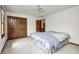 Cozy bedroom featuring a ceiling fan and double door closet at 7688 Gunsmith Ct, Plainfield, IN 46168