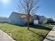 Exterior of a home with a two-car garage and a well-maintained yard at 8019 Gathering Ln, Indianapolis, IN 46259