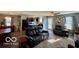 Open-concept area seamlessly connects living room and kitchen offering ample natural light at 8019 Gathering Ln, Indianapolis, IN 46259