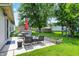 Enjoy the patio and lush green space for outdoor living and entertaining at 902 Helm Dr, Avon, IN 46123