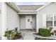 Close-up of the charming front door and entry of the home at 9157 Tansel Crk Dr, Indianapolis, IN 46234