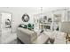 Bright living room featuring stylish white marble floors and modern decor with an open floor plan at 9157 Tansel Crk Dr, Indianapolis, IN 46234