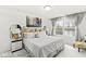 Calming main bedroom featuring large picture window with water views, decorative wall art and an ensuite bath at 9157 Tansel Crk Dr, Indianapolis, IN 46234