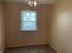 Cozy bedroom with a ceiling fan, window and natural light at 9169 Hibben Ave, Indianapolis, IN 46229