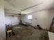 Spacious garage featuring an automatic door opener and ample space for storage and vehicles at 9169 Hibben Ave, Indianapolis, IN 46229