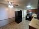 Bright eat-in kitchen features stainless appliances and updated cabinetry at 9169 Hibben Ave, Indianapolis, IN 46229