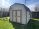 Well-maintained outdoor shed for extra storage space in a grassy backyard at 9169 Hibben Ave, Indianapolis, IN 46229