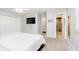 This cozy bedroom features plush carpeting, a closet, and an ensuite bathroom at 9270 N Temple Ave, Indianapolis, IN 46240