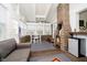 Cozy sunroom with brick accents, vaulted ceilings, and lots of natural light at 9270 N Temple Ave, Indianapolis, IN 46240
