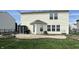 A well maintained backyard with a shed, patio, and nice lawn at 9873 Blue Ridge Way, Indianapolis, IN 46234