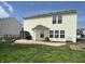 A well maintained backyard with a shed, patio, and nice lawn at 9873 Blue Ridge Way, Indianapolis, IN 46234