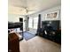 This bedroom includes a bunk bed, a TV, and walls decorated with posters at 9873 Blue Ridge Way, Indianapolis, IN 46234