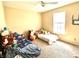 A bedroom with carpeted floors and two beds at 9873 Blue Ridge Way, Indianapolis, IN 46234