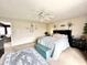 Comfortable main bedroom features neutral walls, ceiling fan, and stylish decor at 9873 Blue Ridge Way, Indianapolis, IN 46234