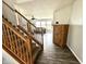 Carpeted staircase with wooden railings and steps leading to the upper level at 9873 Blue Ridge Way, Indianapolis, IN 46234