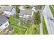 Aerial view of home featuring manicured lawn, landscaping, and backyard patio at 10471 Meadow Lake Dr, Fishers, IN 46038