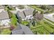 Aerial view of home with backyard trees, landscaping, and manicured lawns at 10471 Meadow Lake Dr, Fishers, IN 46038