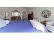 Bright bedroom featuring a comfortable bed, dresser, and cozy seating area at 10471 Meadow Lake Dr, Fishers, IN 46038