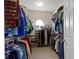 Spacious walk-in closet featuring shelving on both sides for optimal clothing and shoe storage at 10471 Meadow Lake Dr, Fishers, IN 46038
