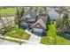 A two-story brick house with a two-car garage and a well-maintained lawn and landscape at 10471 Meadow Lake Dr, Fishers, IN 46038