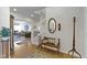 Cozy foyer with hardwood floors, staircase, and a view into the living room at 10471 Meadow Lake Dr, Fishers, IN 46038