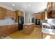 Open kitchen with center island, modern stainless steel appliances, and lots of cabinet space at 10471 Meadow Lake Dr, Fishers, IN 46038