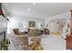 Spacious living room with fireplace, plush seating, and neutral decor at 10471 Meadow Lake Dr, Fishers, IN 46038