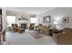 Cozy living room showcasing a fireplace, comfortable seating, and natural light at 10471 Meadow Lake Dr, Fishers, IN 46038