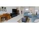 Inviting living area featuring neutral decor, a black console, and comfortable seating arrangement at 10471 Meadow Lake Dr, Fishers, IN 46038