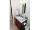 Bathroom featuring a modern vanity, wooden cabinets, a mirror, and a toilet at 1053 Reserve Way, Indianapolis, IN 46220