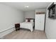 Cozy bedroom with a bed, wardrobe and wooden floors, a blank canvas ready to be personalized at 1053 Reserve Way, Indianapolis, IN 46220