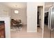 View of dining area from kitchen, showing table with bench and four chairs at 1053 Reserve Way, Indianapolis, IN 46220
