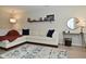 Bright living room with a sectional sofa, hardwood floors, and stylish decor at 1053 Reserve Way, Indianapolis, IN 46220