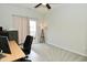 Comfortable office space with a sliding glass door, desk and comfortable chair at 1053 Reserve Way, Indianapolis, IN 46220