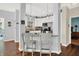 Kitchen featuring granite counters, stainless appliances, and breakfast bar seating at 10955 Chapel Woods N Blvd, Noblesville, IN 46060