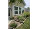 Landscaped garden along the side of the house with stone edging, complemented by the home's exterior at 10955 Chapel Woods N Blvd, Noblesville, IN 46060