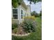 A colorful flower garden decorates the exterior of this well maintained home at 10955 Chapel Woods N Blvd, Noblesville, IN 46060