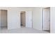 Bedroom featuring plush carpeting and open doorways to other rooms at 10965 Morab Dr, Zionsville, IN 46077