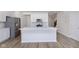 Bright and airy kitchen with an island, stainless steel appliances, and modern finishes at 10965 Morab Dr, Zionsville, IN 46077