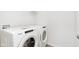 Laundry room featuring a Whirlpool washer and dryer at 10965 Morab Dr, Zionsville, IN 46077
