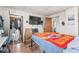 Bedroom with a view into the kitchen and a fan at 1126 N Anderson St, Elwood, IN 46036