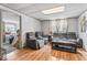 Relaxing living area featuring comfortable seating and laminate wood flooring at 1126 N Anderson St, Elwood, IN 46036