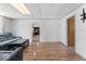 Spacious living room with light wood flooring and a large sofa and chair set at 1126 N Anderson St, Elwood, IN 46036