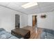 Inviting living room featuring light wood flooring and a comfortable sofa and chair set at 1126 N Anderson St, Elwood, IN 46036