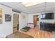 Spacious living area with laminate flooring and a view into other rooms at 1126 N Anderson St, Elwood, IN 46036