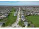 This is an aerial view of a residential neighborhood with mature trees and landscaping at 12258 Weathered Edge Dr, Fishers, IN 46037