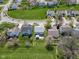 This is an aerial view of homes in a neighborhood with mature trees and landscaping at 12258 Weathered Edge Dr, Fishers, IN 46037