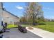 Backyard patio featuring a fire pit, cozy seating, and a hammock for relaxation at 12258 Weathered Edge Dr, Fishers, IN 46037