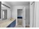 Bathroom featuring a shower, a sink and a door to the bedroom at 12258 Weathered Edge Dr, Fishers, IN 46037